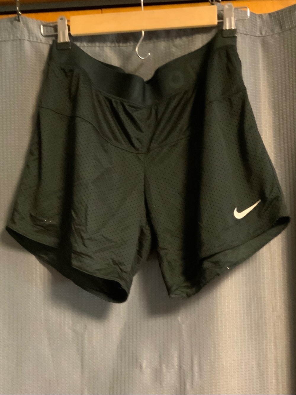 Nike Women's Black Mesh Athletic Shorts with White Swoosh